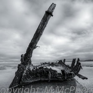 The wreck of the Sine, lying on the beach of  Bartragh Island  since 1927.