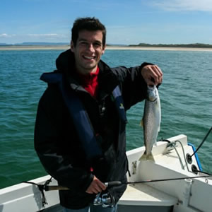A French visitor with a sea trout caught on a fantastic day.  June 2010.