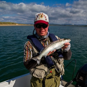 A regular visitor from Germany, we both took many trout over 2 days of great fishing. June 2011.
