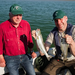 A father and son from Germany who, despite very difficult fishing, took these two fine trout. September 2014.